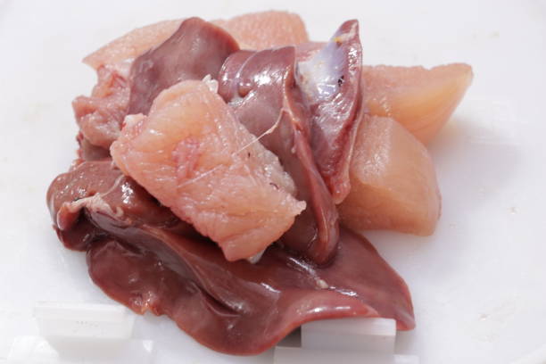 istock Sliced chicken on the white background 1217588030