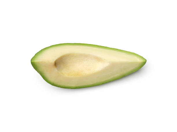 авокадо изолированы на белом фоне - avocado portion brown apple core стоко�вые фото и изображения