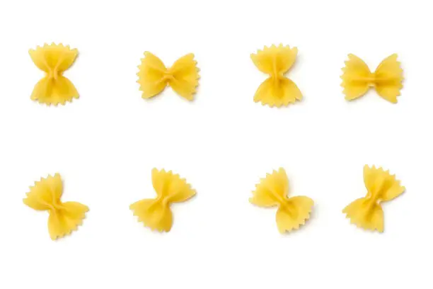 Farfalle pasta isolated on white background. Top view