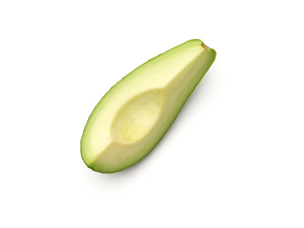 白い背景に分離されたアボカド - avocado portion brown apple core ストックフォトと画像