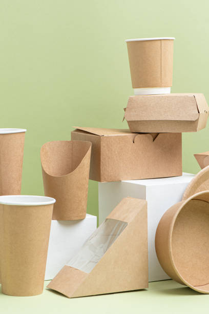 istock Various food containers on pedestals over green 1217588889
