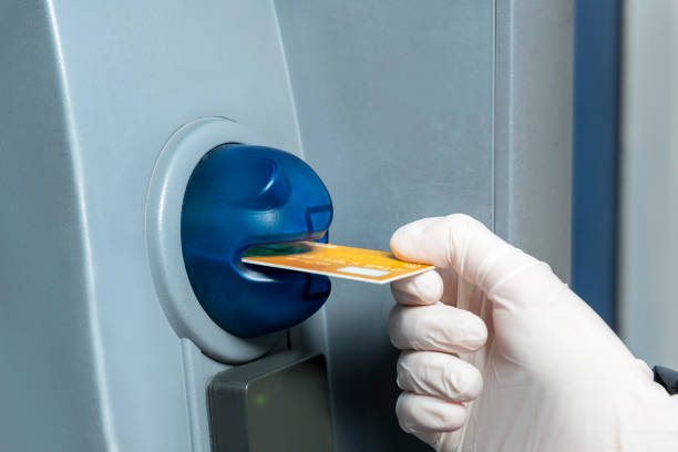 istock Gold Card Entry in ATM 1217588906