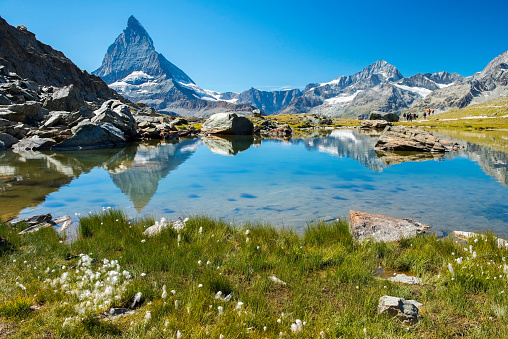 picturesque landscape with wild nature and glacial lake in the Pennine Alps, in the background peak Matterhorn, canton of Valais, Switzerland