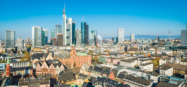 Aerial panoramic view across Frankfurt’s dynamic skyline, from the historic landmarks of the Old Town to the futuristic spires of the banking skyscrapers and the shops of Zeil and Hauptwache, Hesse, Germany.