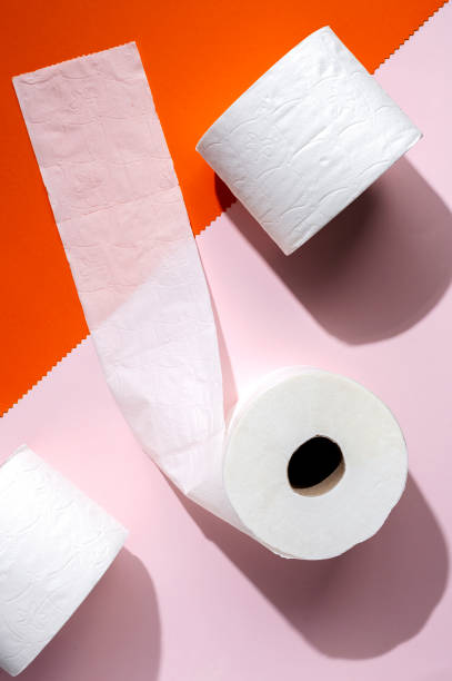 istock white toilet paper rolls on colored backgrounds 1217590250