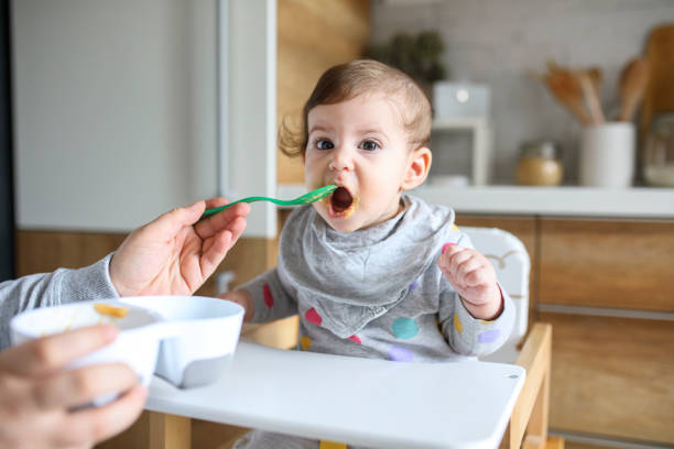istock Feeding The Baby 1217590379