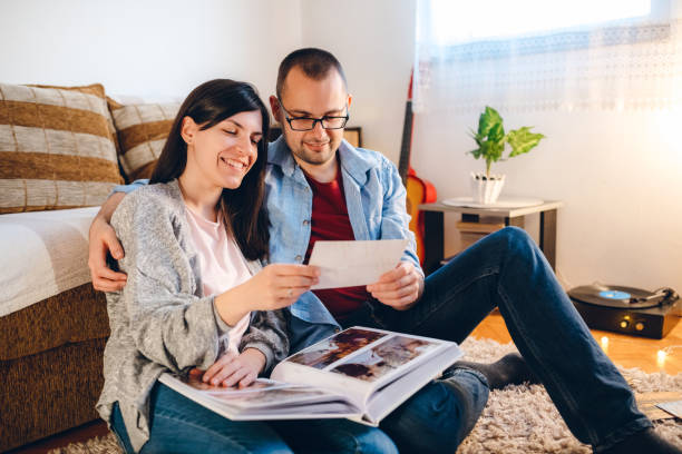 istock Looking at wedding photos 1217592060