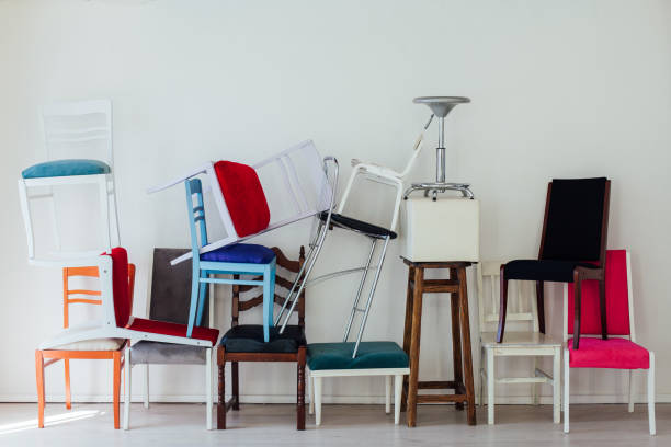 istock different multicolored chairs in the interior of the white room 1217594028