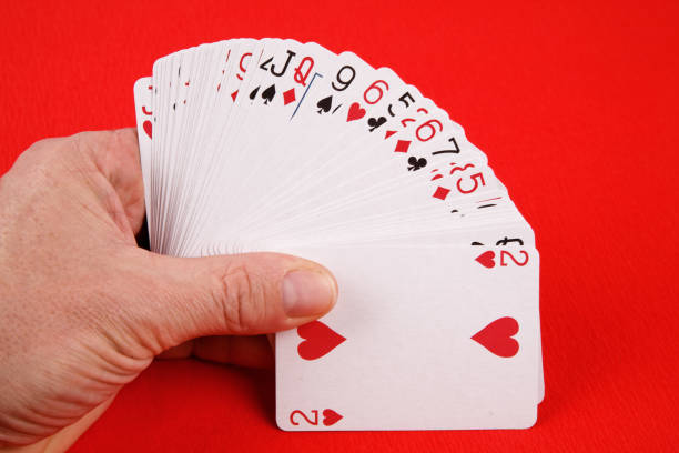 istock Card games and a hand 1217594083
