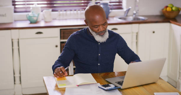 istock Busy with the monthly budget 1217597151
