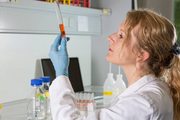 istock Scientist Analyzing Chemical In Test Tube At Laboratory 1217601620