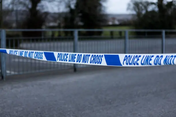 Police cordon tape at a crime scene in the UK