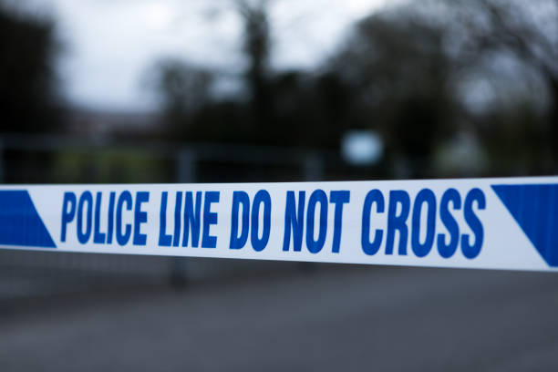 istock Police barrier tape in the UK 1217602684
