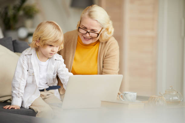 istock Grandmother teaching her grandson 1217602774