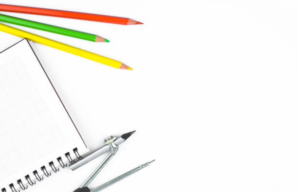 istock Study materials containing various color pencil,a pencil compass and a paper diary 1217605291