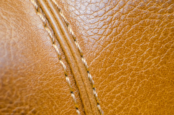 istock Brown leather texture close up. background for design-works. 1217607836