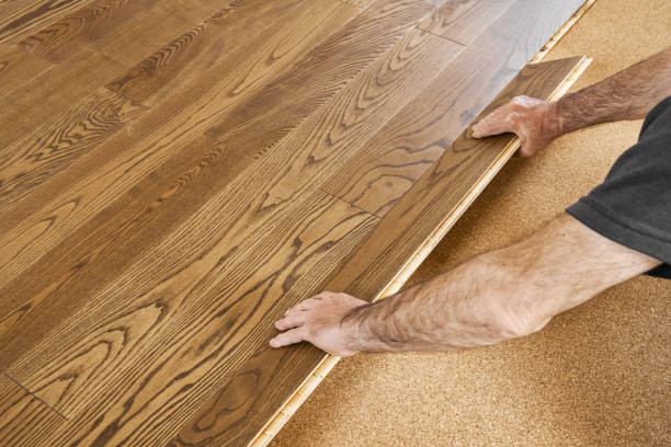istock Process of floor installation in new house 1217607884