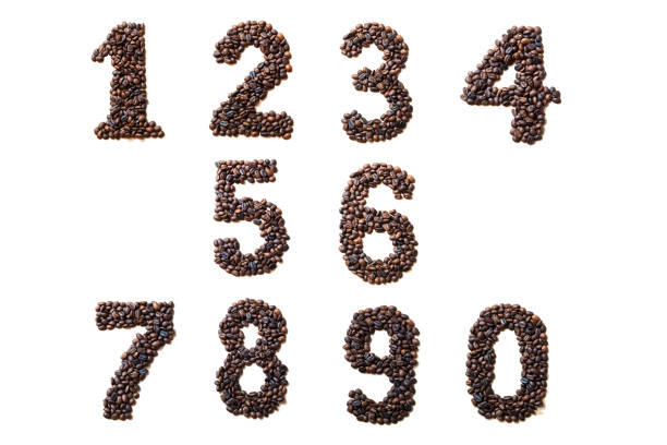 number made with coffee beans on white background. - lpn imagens e fotografias de stock
