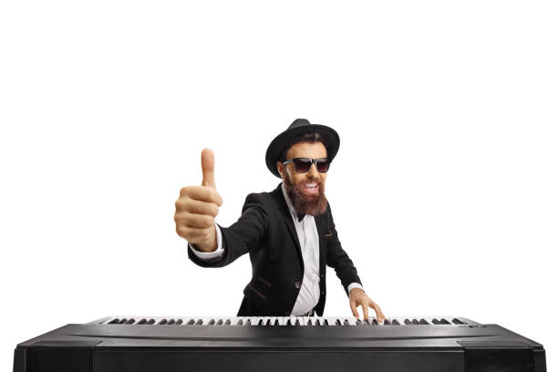 Musician playing a digital piano and showing thumbs up isolated on white background
