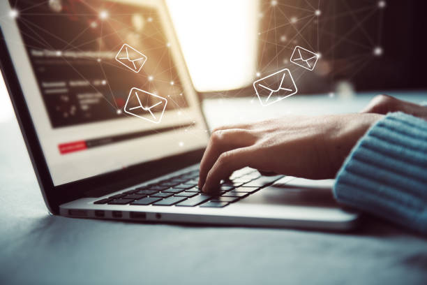 istock Closeup Woman hand using Laptop pc with email icon, Work from home, Email concept 1217610955