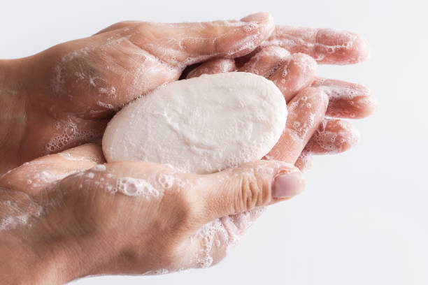 istock Close-up of female hands with a soap 1217611124