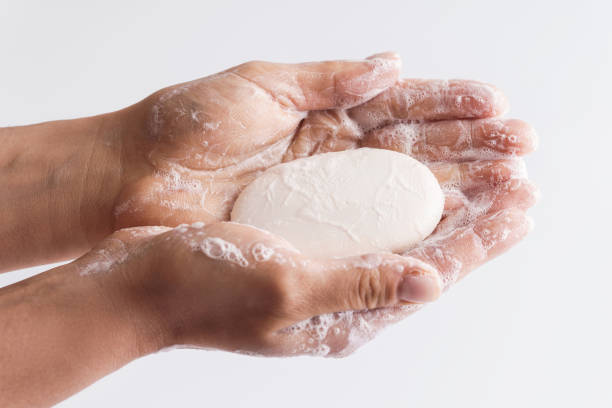istock Close-up of female hands with a soap 1217611222