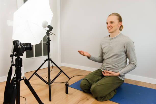 istock Online yoga meditation, webinar, wloger streaming, teaching from home 1217612995
