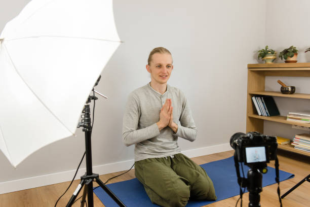 istock Online yoga practice, webinar e-learning, teacher working at home 1217613130