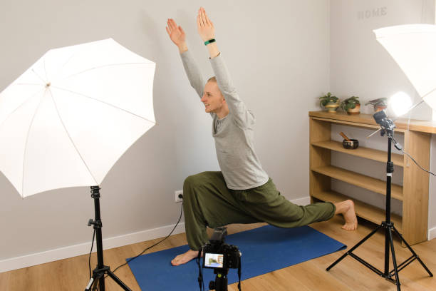 istock Online yoga practice, webinar e-learning, teacher working at home 1217613139
