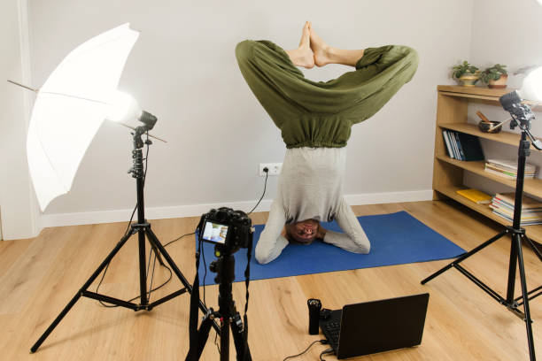 istock Online yoga practice, webinar e-learning, teacher working at home 1217613167
