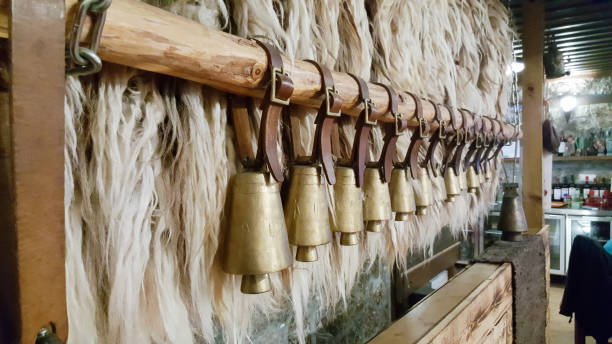 istock Bulgarian copper bells hanging on a wooden stick. 1217613191