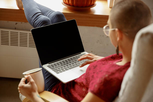 istock Woman working from home during coronavirus or COVID-19 quarantine, remote office concept 1217616461