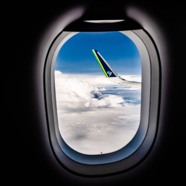 Airbus A320neo window, wing, winglets, Blue - Cruise Flight - Cruise Flight - 39000ft Brazilian Airspace - Brazil, January 13, 2020: Airbus A320neo Azul wing view on the cruise flight above the clouds at 39,000 feet (fl390). airbus a320 stock pictures, royalty-free photos & images