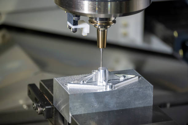 istock The CNC milling machine finishing cutting  the injection mold parts by  solid ball  endmill tools. 1217620335