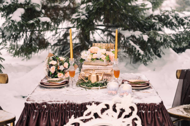 istock Wedding decor in the winter. Decorated table for the bride and groom. Wedding table setting 1217621292