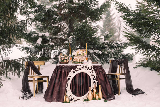 istock Wedding decor in the winter. Decorated table for the bride and groom. Wedding table setting 1217621333