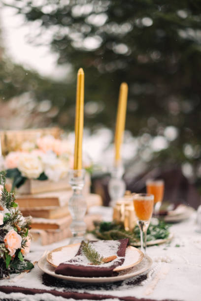 istock Wedding decor in the winter. Decorated table for the bride and groom. Wedding table setting 1217621484
