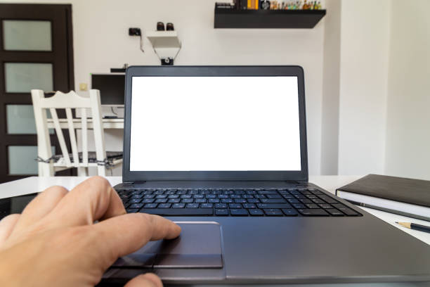 istock Low angle view of a person working on a laptop from home 1217623623