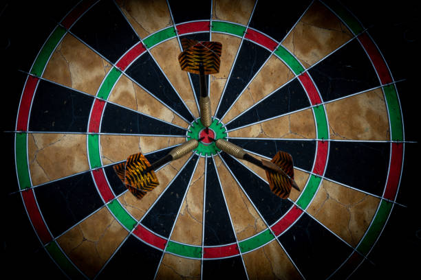 istock Dartboard with Three Darts in the Bull's Eye 1217627134