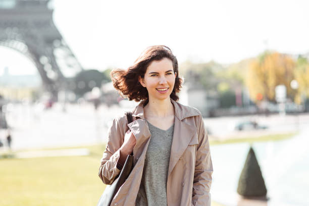 istock business woman in paris using the phone 1217627902