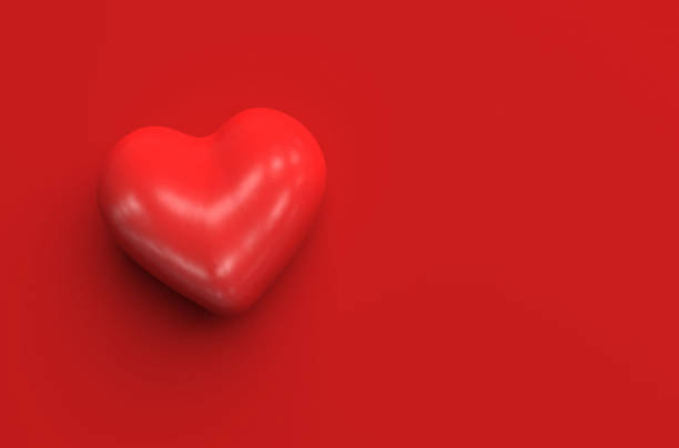 istock Single red heart shape on a red background. Top view. Monochrome illustration with copy space. 3D render 1217630944