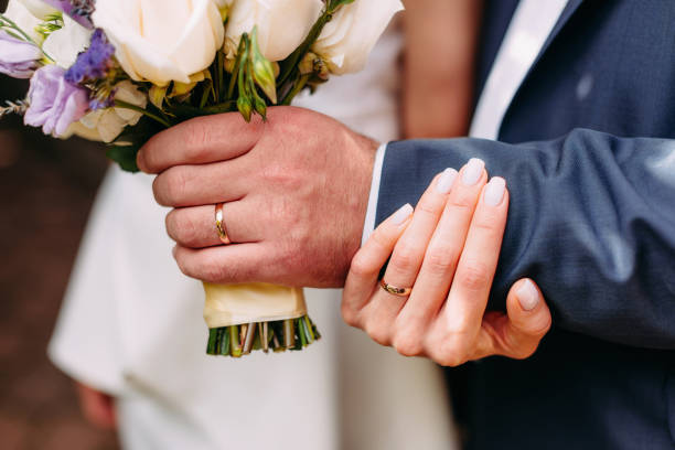 istock Wedding rings close-up. Wedding accessories bride and groom 1217632701