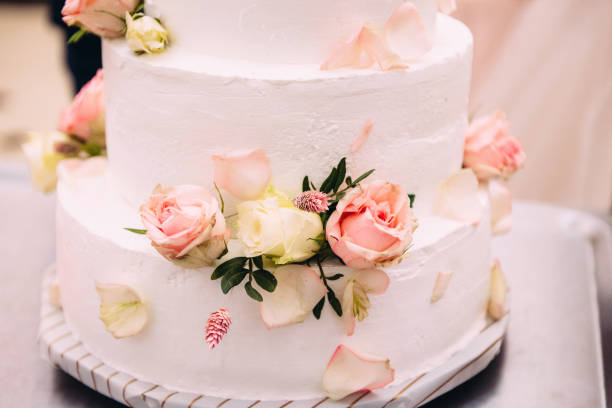 istock Wedding cake with fresh flowers. Holiday cake 1217633882