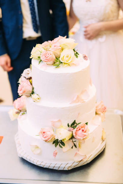 istock Wedding cake with fresh flowers. Holiday cake 1217633906