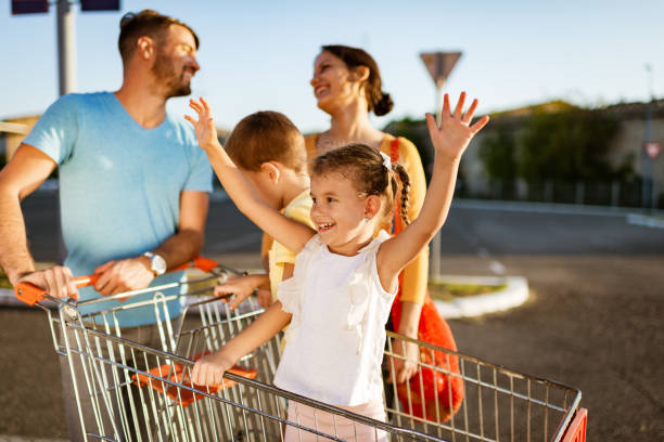 istock Family having fun after grocery shopping 1217634251