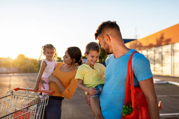 istock Family having fun after grocery shopping 1217634371