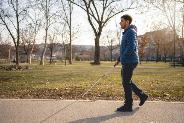 istock Young man with low eyesight having a relaxing morning walk 1217635116