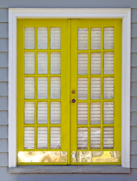 istock Yellow French Doors 1217635847