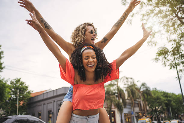 istock Piggyback riding is so fun when you have crazy friend 1217637410