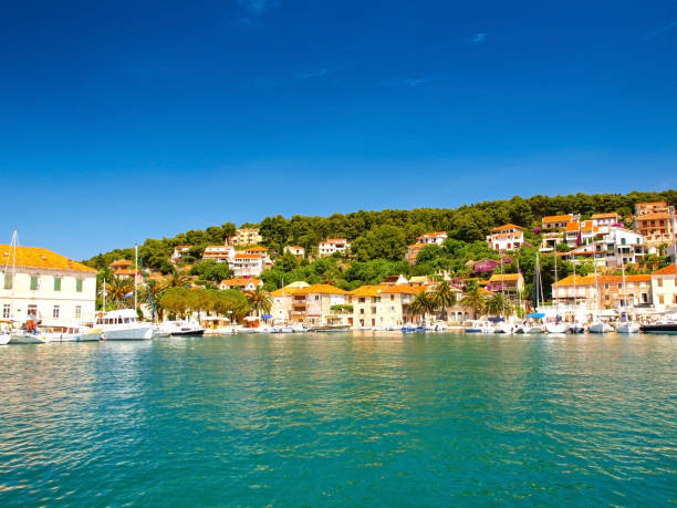 Jelsa bay on Hvar island Jelsa, Hvar island, Croatia - June 21st 2014:  Jelsa fishing town is an ideal destination for all those who are looking to benefit from the rich monumental heritage and natural beauties of Hvar island. jelsa stock pictures, royalty-free photos & images